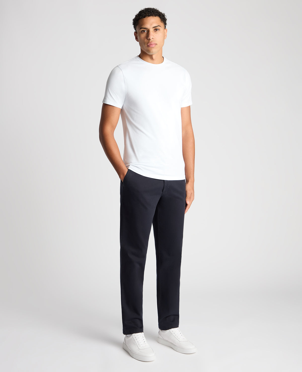 Man wearing a navy Slim Leg Cotton-Stretch Chino