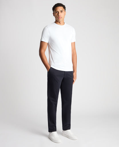 Man wearing a navy Slim Leg Cotton-Stretch Chino
