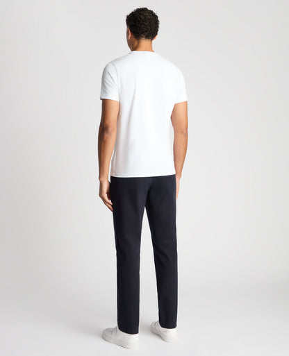Man wearing a navy Slim Leg Cotton-Stretch Chino