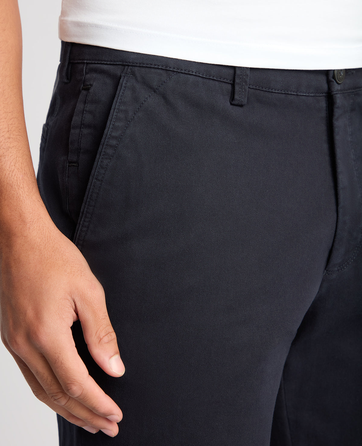 Man wearing a navy Slim Leg Cotton-Stretch Chino