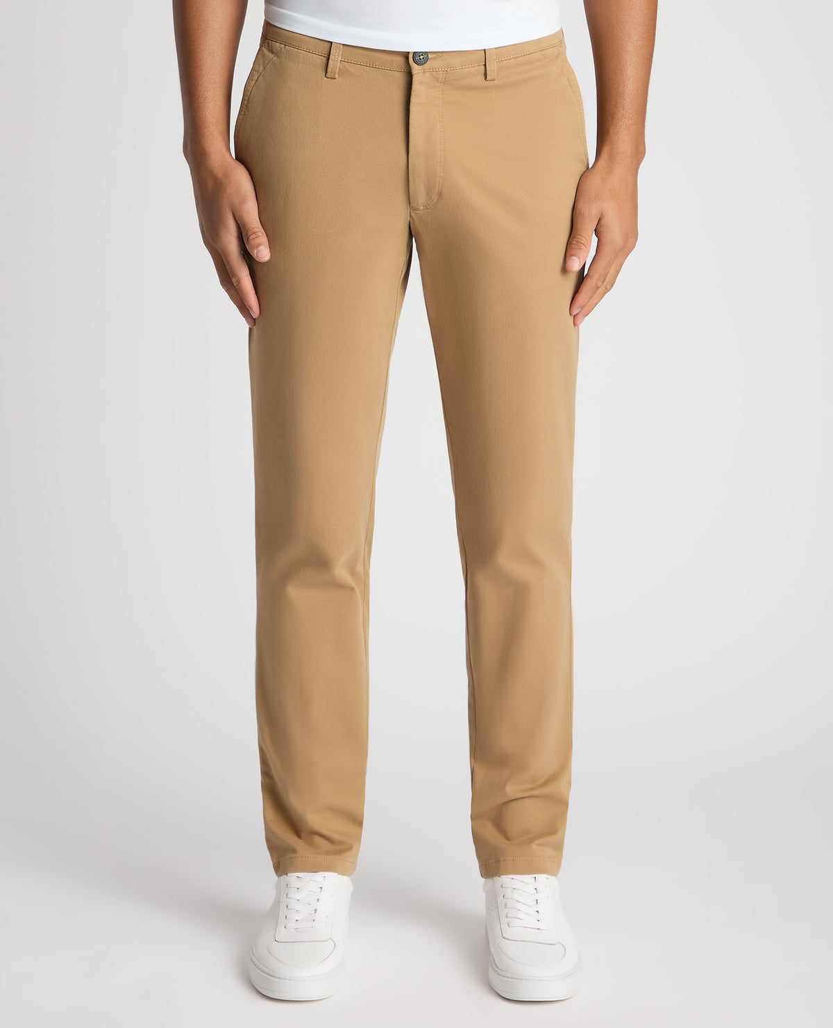 Man wearing a sand Slim Fit Cotton-Stretch Washed Chino