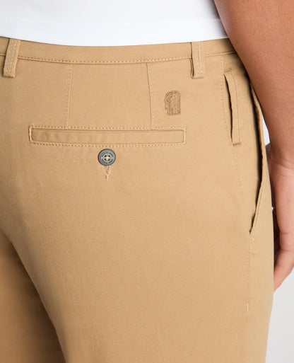 Man wearing a sand Slim Fit Cotton-Stretch Washed Chino