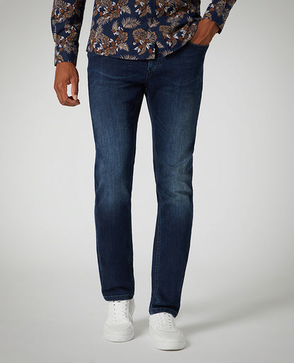 Man wearing a blue Slim Leg Cotton Power Stretch Jean