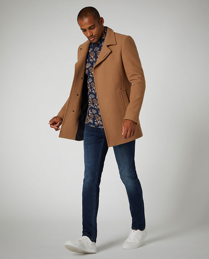 Man wearing a blue Slim Leg Cotton Power Stretch Jean