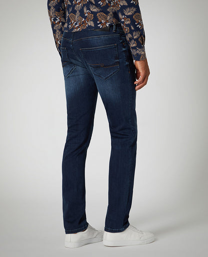 Man wearing a blue Slim Leg Cotton Power Stretch Jean