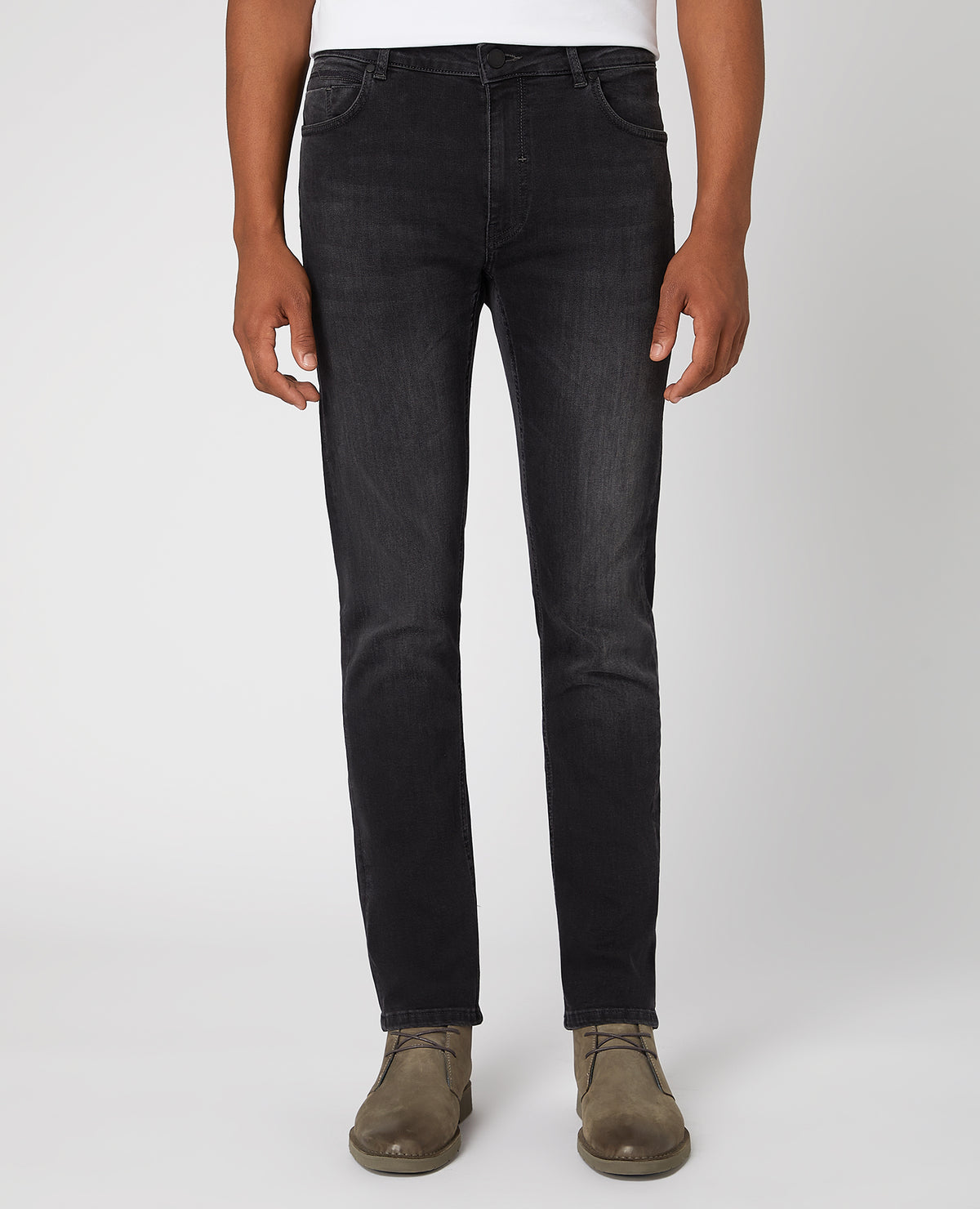 Man wearing a grey Apollo Slim Leg Cotton Power Stretch Jeans