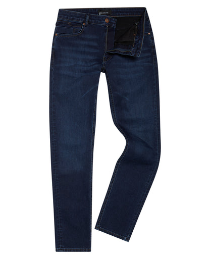 Man wearing a navy Apollo Slim Leg Cotton Power Stretch Jean