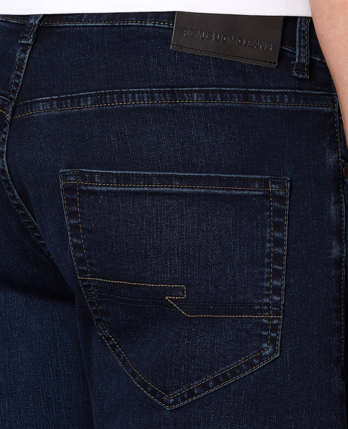 Man wearing a navy Apollo Slim Leg Cotton Power Stretch Jean