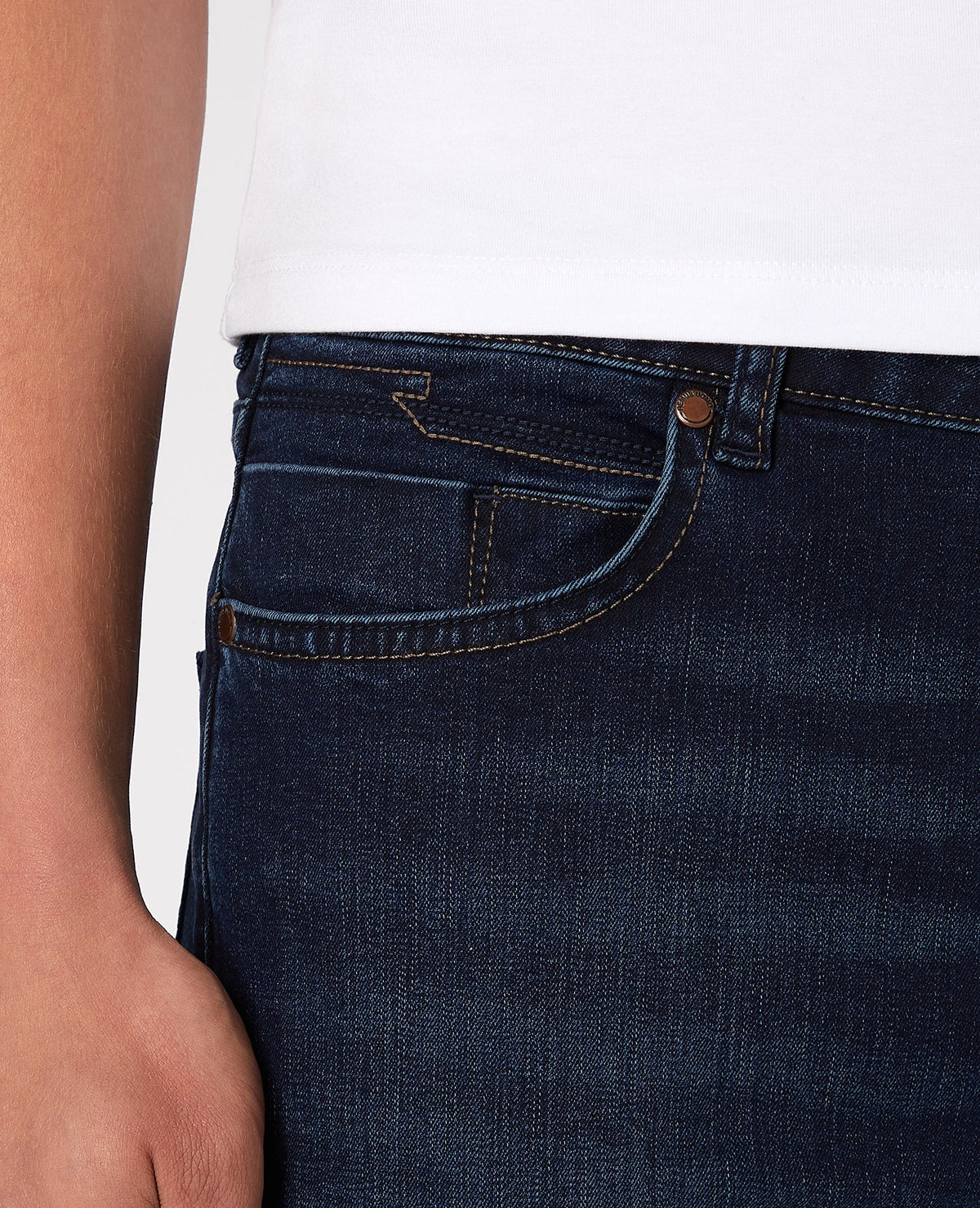 Man wearing a navy Apollo Slim Leg Cotton Power Stretch Jean