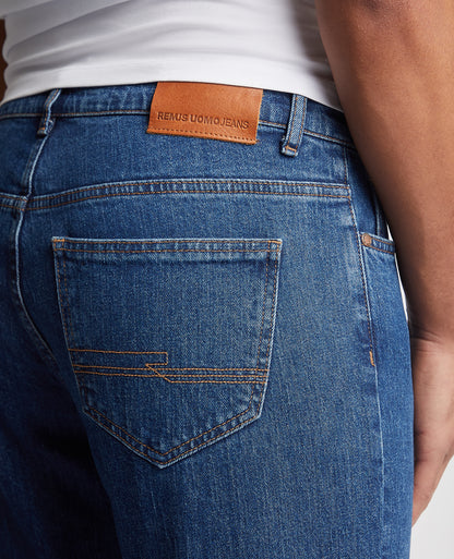 Man wearing a blue Relaxed Fit Comfort Stretch Jean