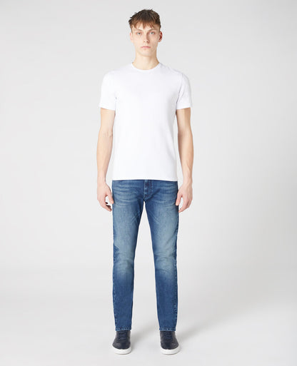 Man wearing a blue Slim Leg Comfort Stretch Jean