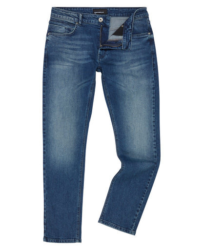 Man wearing a blue Slim Leg Comfort Stretch Jean