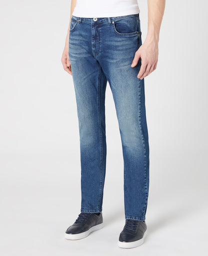 Man wearing a blue Slim Leg Comfort Stretch Jean