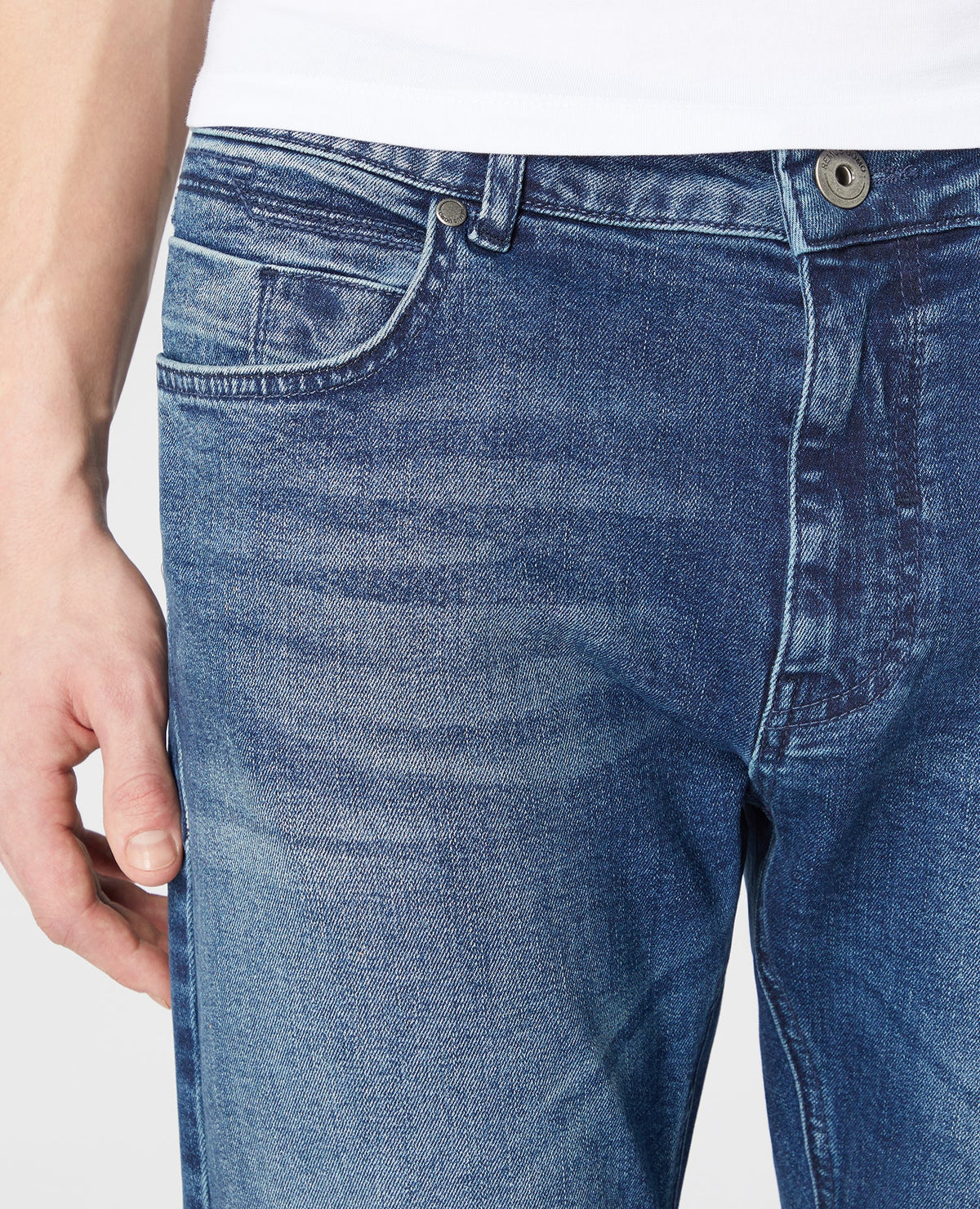 Man wearing a blue Slim Leg Comfort Stretch Jean