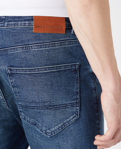 Man wearing a blue Slim Leg Comfort Stretch Jean
