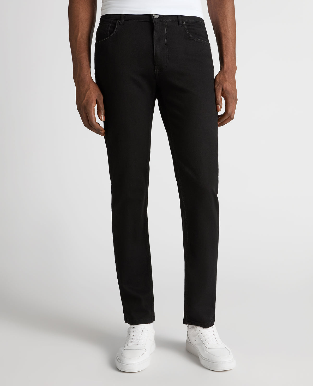 Man wearing a black Rogan Straight Leg Powerstretch Jean