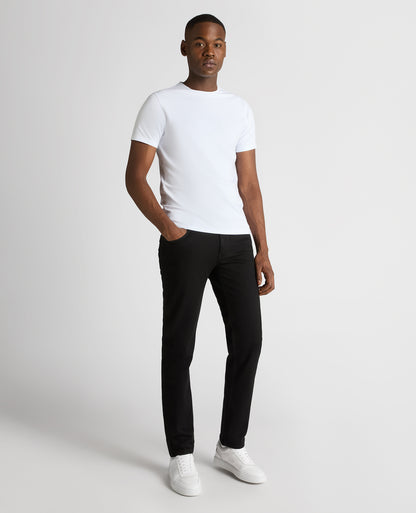 Man wearing a black Rogan Straight Leg Powerstretch Jean