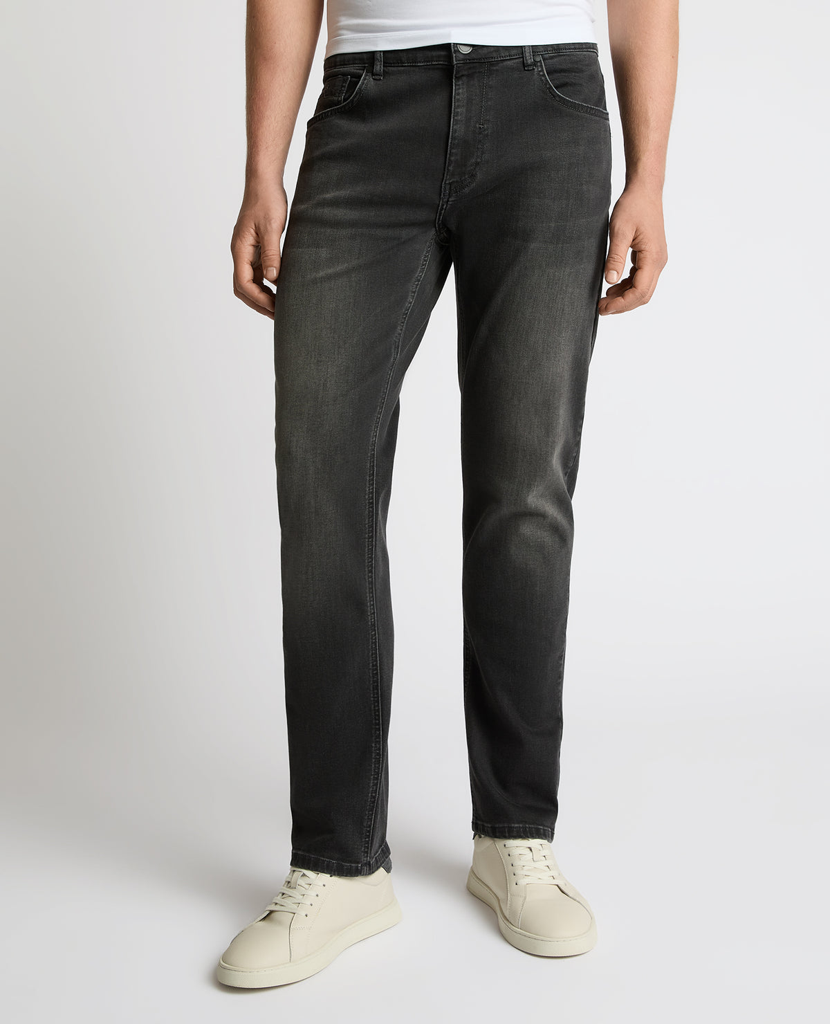 Man wearing a grey Rogan Dark Wash Straight Leg Jeans