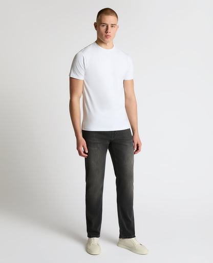 Man wearing a grey Rogan Dark Wash Straight Leg Jeans