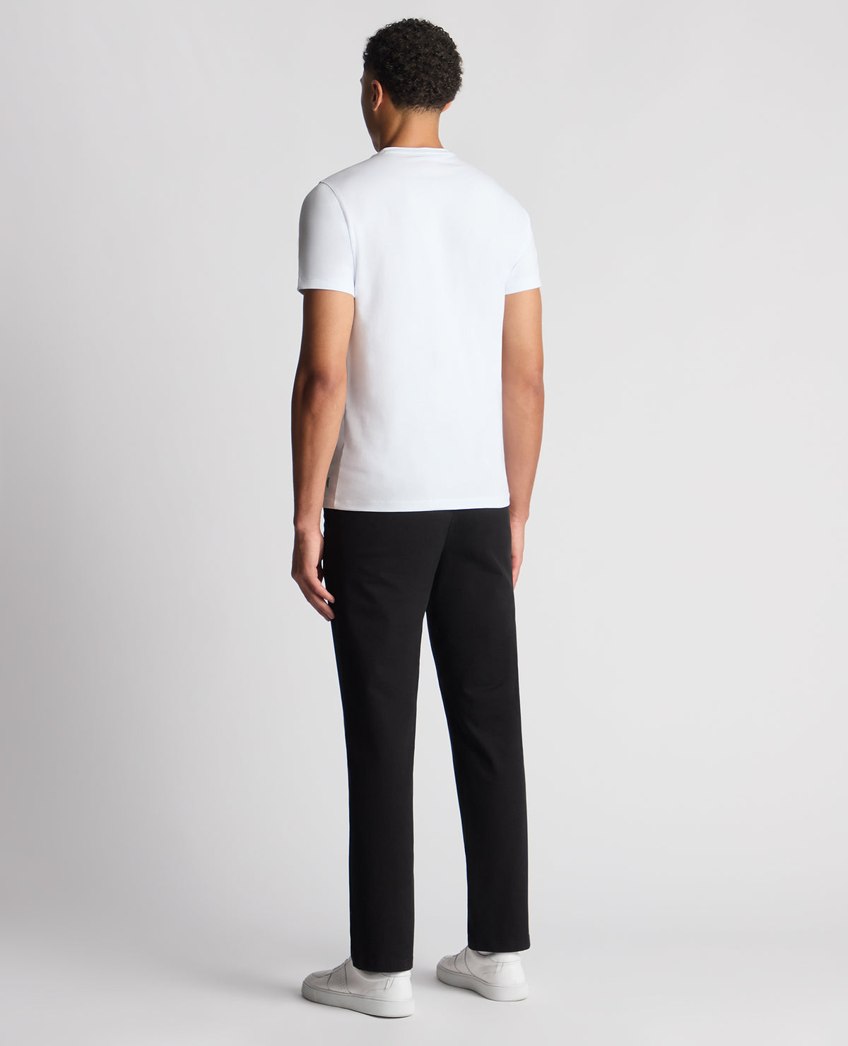 Man wearing a black Straight Leg Cotton-Stretch Ronan Chino