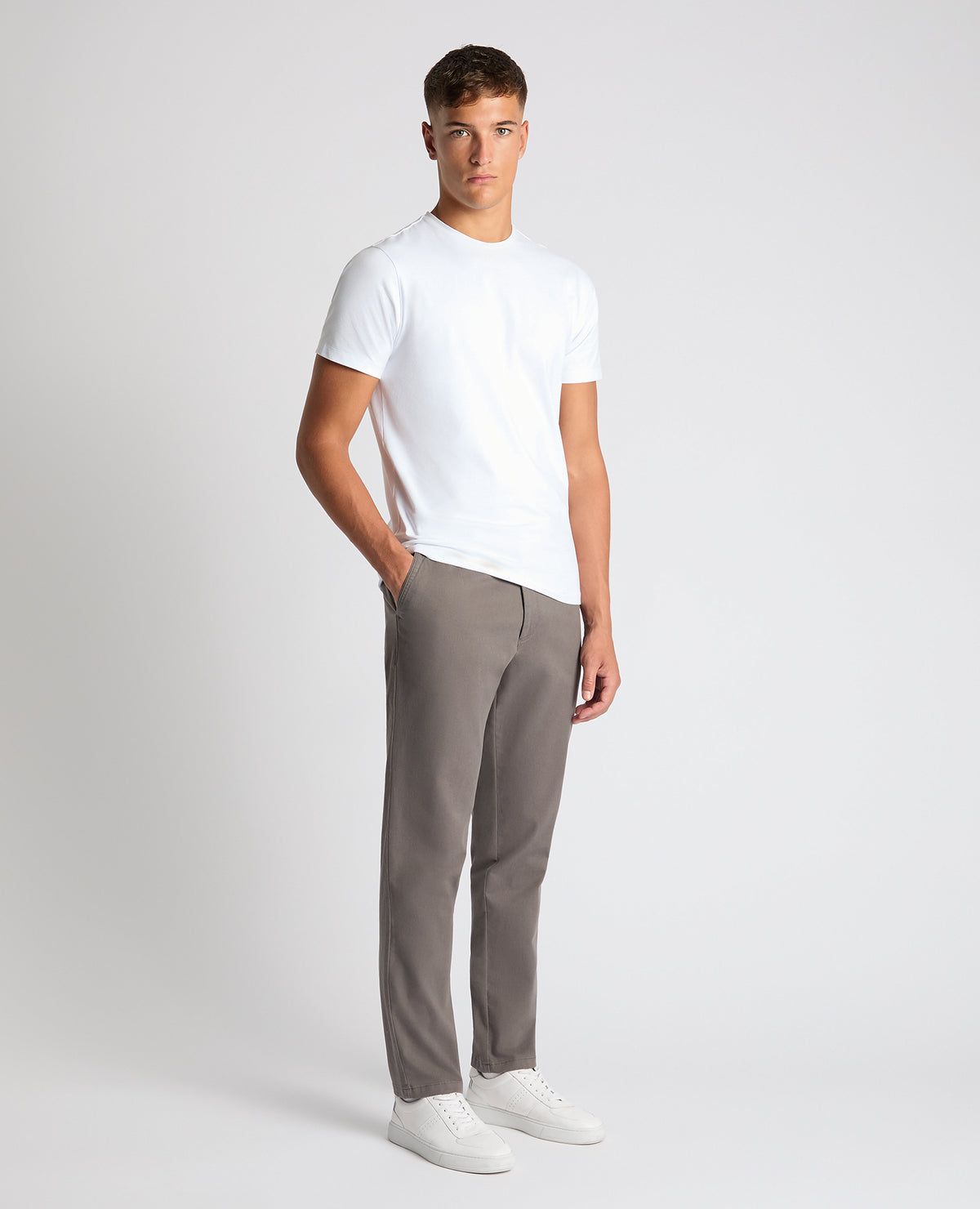Man wearing a grey Straight Leg Cotton-Stretch Washed Chino