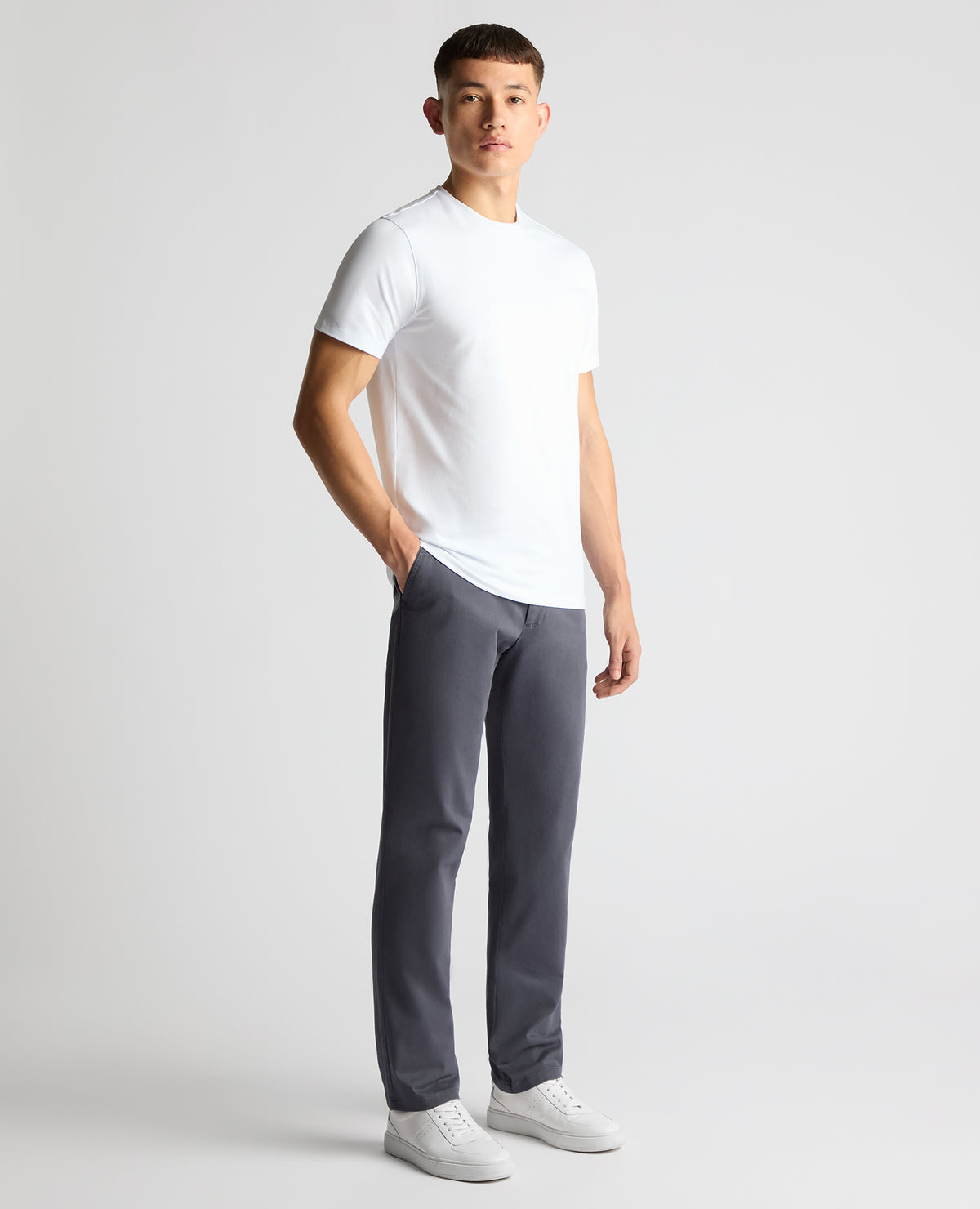 Man wearing a blue Straight Leg Cotton-Stretch Washed Chino