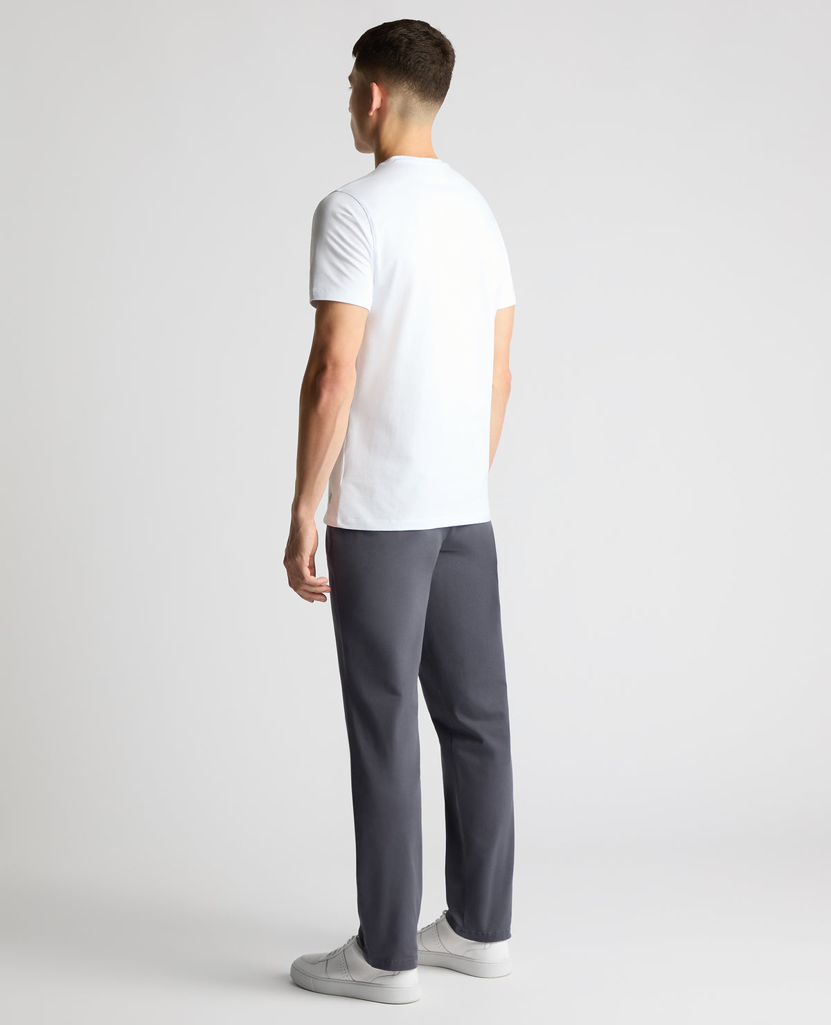 Man wearing a blue Straight Leg Cotton-Stretch Washed Chino