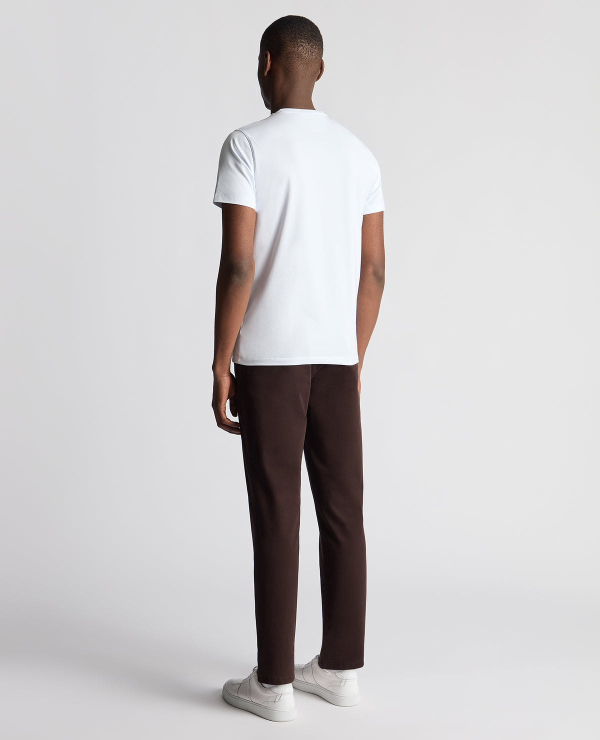 Man wearing a brown Straight Leg Cotton-Stretch Washed Chino
