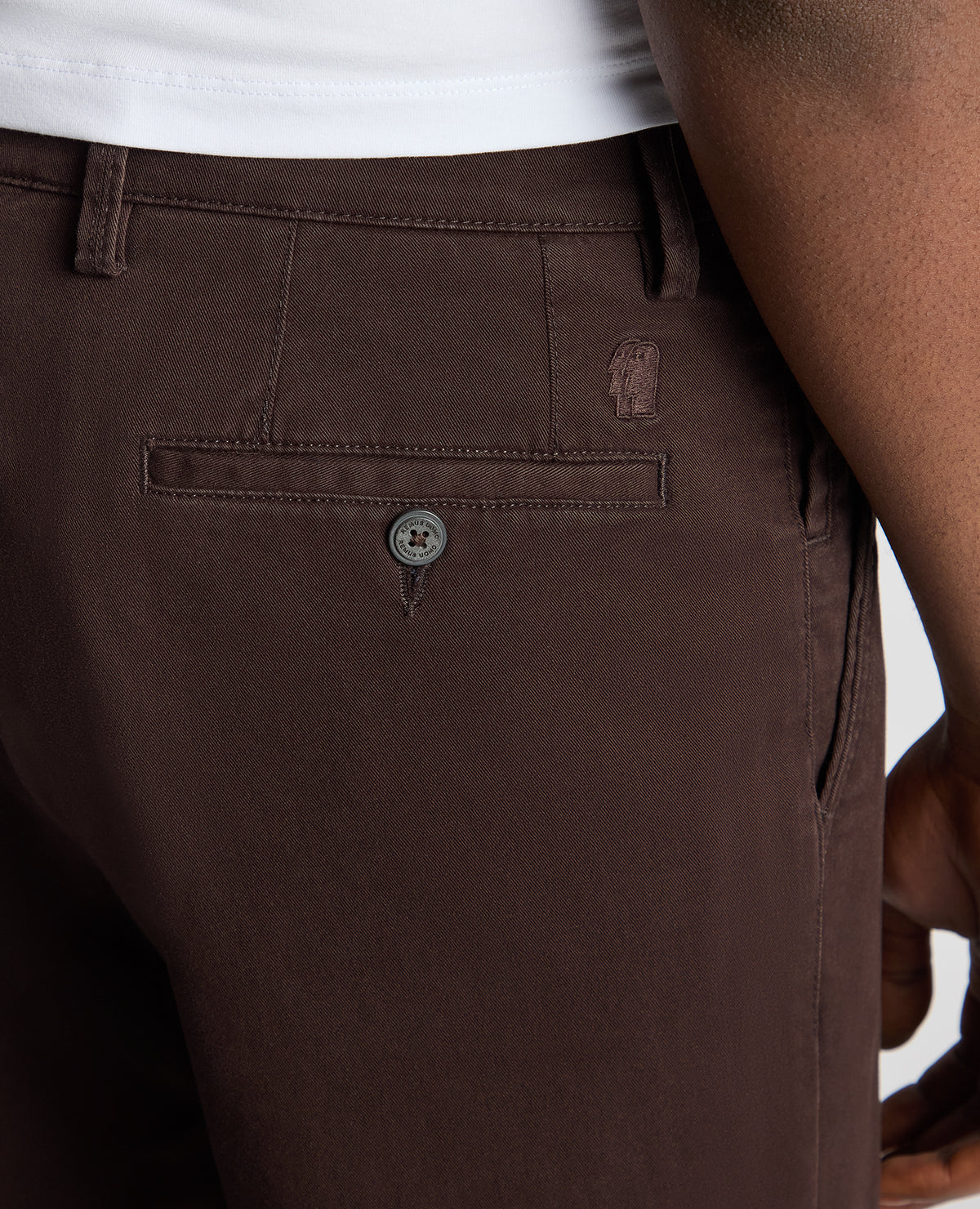 Man wearing a brown Straight Leg Cotton-Stretch Washed Chino