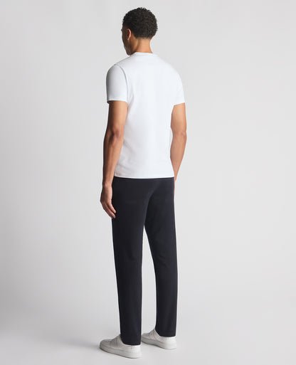 Man wearing a navy Straight Leg Cotton-Stretch Ronan Chino