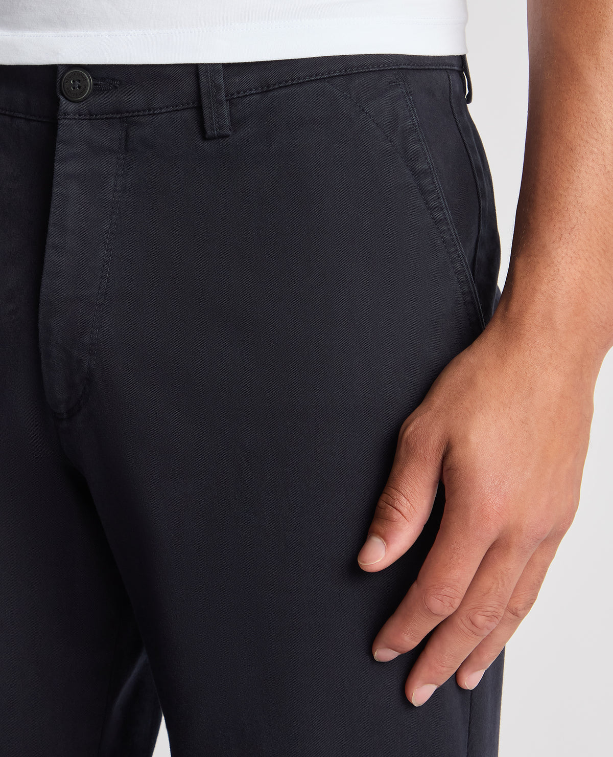 Man wearing a navy Straight Leg Cotton-Stretch Ronan Chino