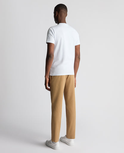 Man wearing a sand Straight Leg Cotton-Stretch Washed Chino