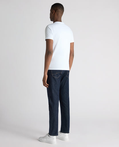 Man wearing a navy Roman Modern Straight Leg Jeans