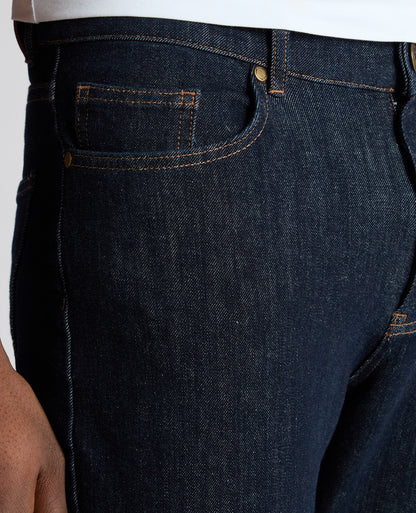 Man wearing a navy Roman Modern Straight Leg Jeans