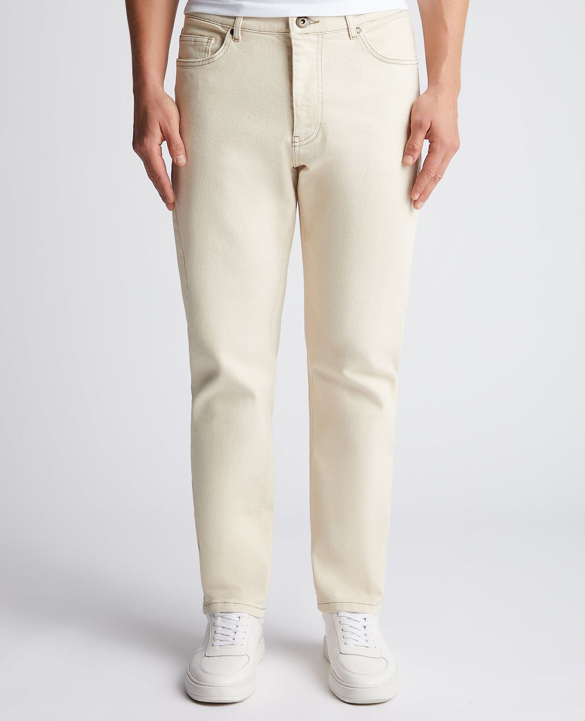 Man wearing a sand Straight Leg Cotton-Blend Stretch Jean