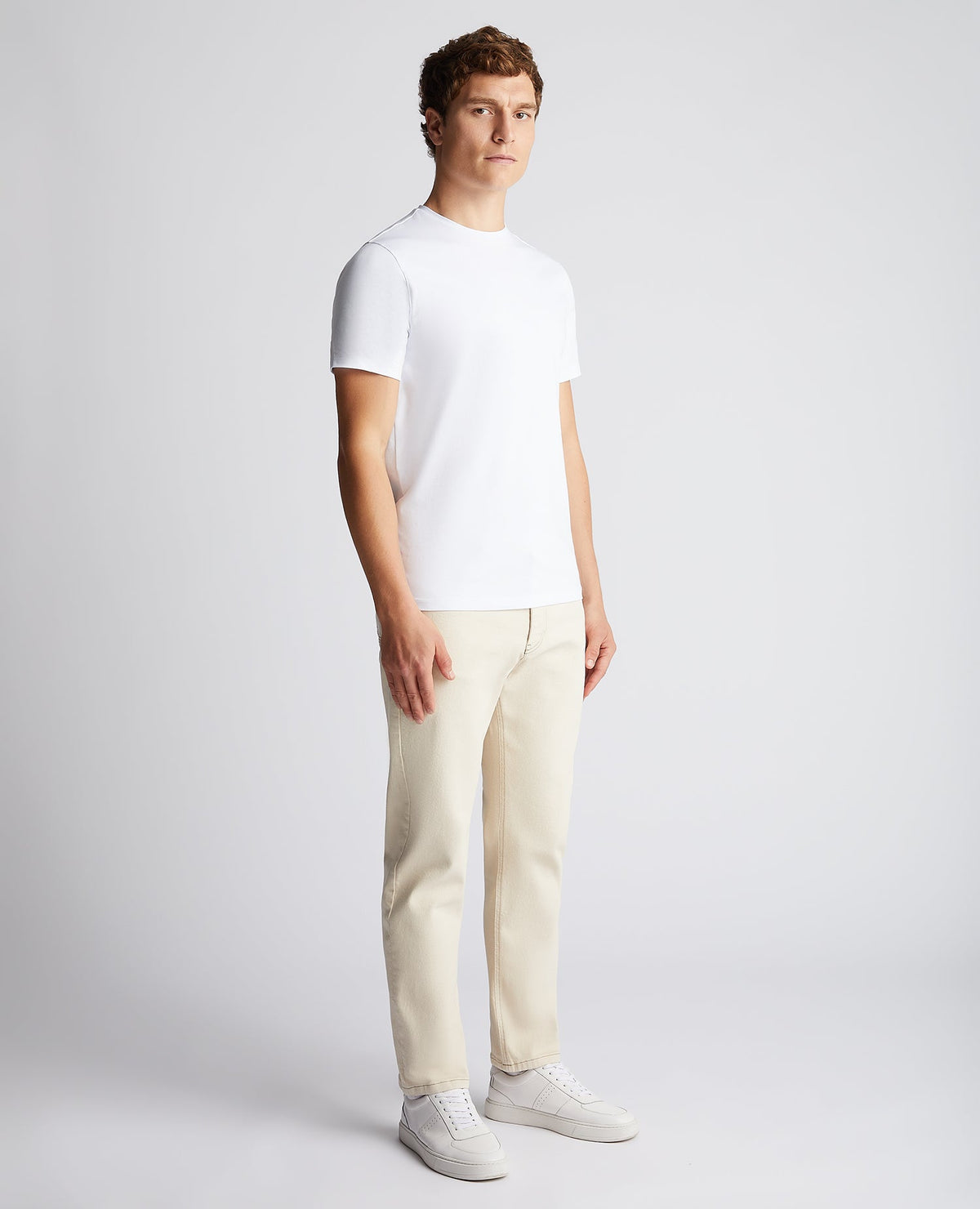 Man wearing a sand Straight Leg Cotton-Blend Stretch Jean