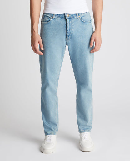 Man wearing a blue Roman Modern Straight Fit Comfort Stretch Jean