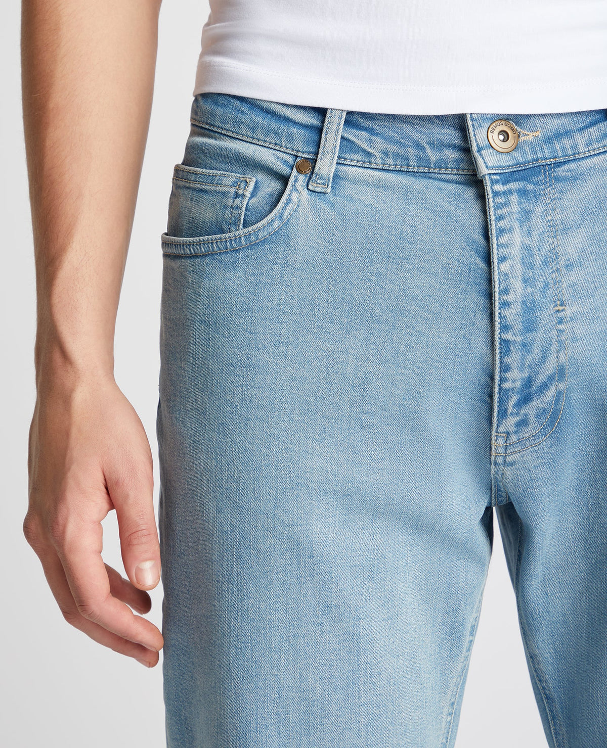 Man wearing a blue Roman Modern Straight Fit Comfort Stretch Jean