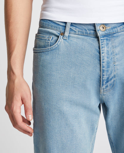 Man wearing a blue Roman Modern Straight Fit Comfort Stretch Jean