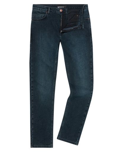 Man wearing a navy Apollo Slim Leg Power Stretch Jeans