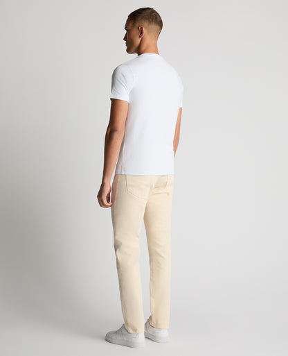 Man wearing a sand Roman Modern Straight Fit Cotton-Stretch Jean