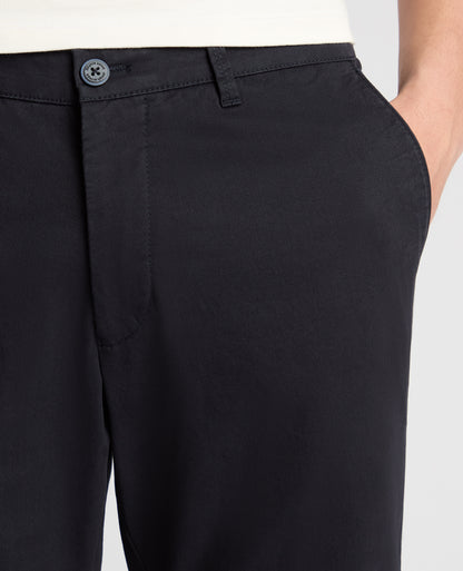 Man wearing a navy chino