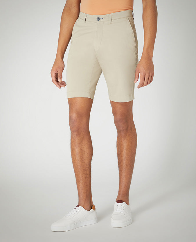 Man wearing a sand Slim Leg Cotton-Stretch Chino Short