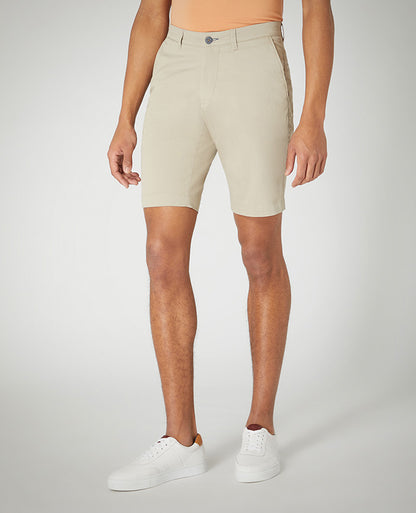 Man wearing a sand Slim Leg Cotton-Stretch Chino Short
