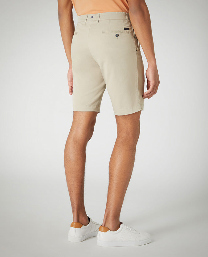 Man wearing a sand Slim Leg Cotton-Stretch Chino Short