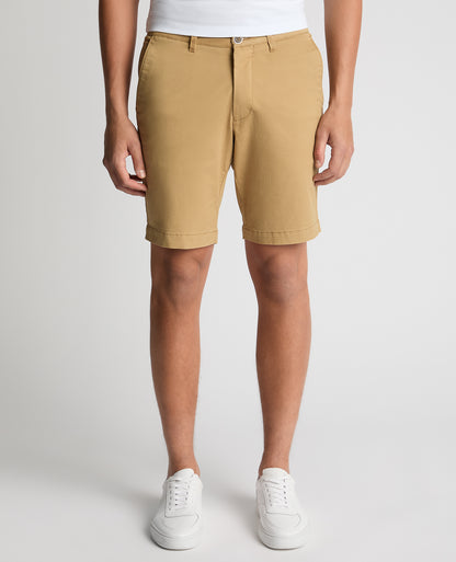 Man wearing a sand Slim Leg Cotton-Stretch Chino Short
