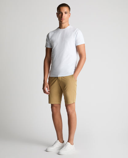 Man wearing a sand Slim Leg Cotton-Stretch Chino Short