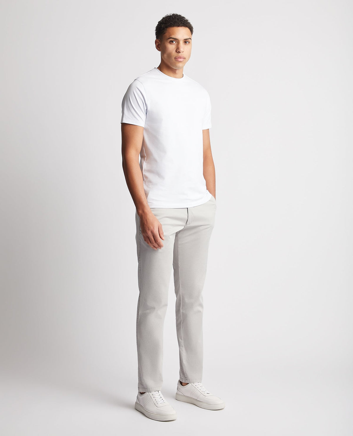 Man wearing a grey Slim Leg Cotton Stretch Chinos
