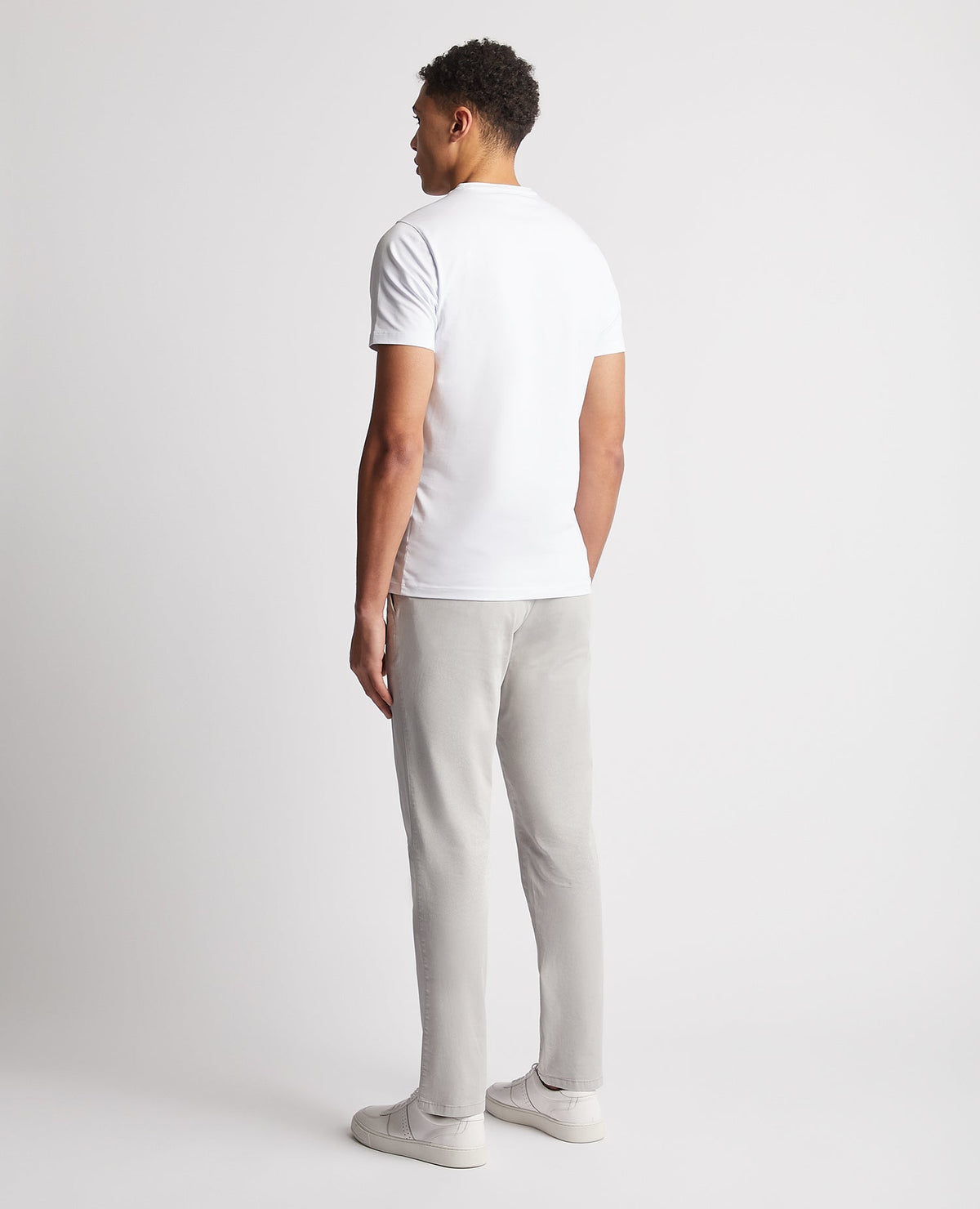 Man wearing a grey Slim Leg Cotton Stretch Chinos