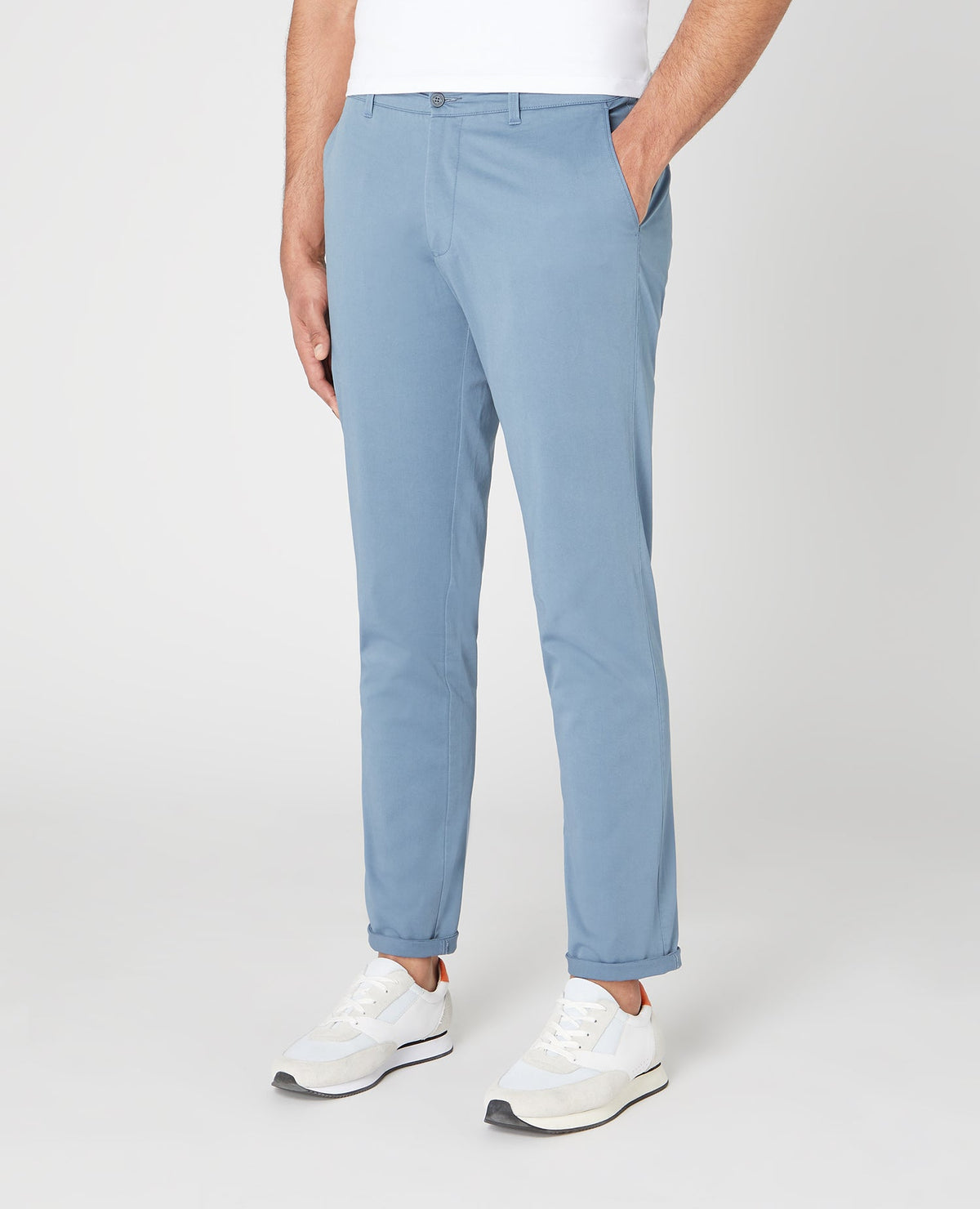 Man wearing a blue Slim Leg Cotton Stretch Chinos